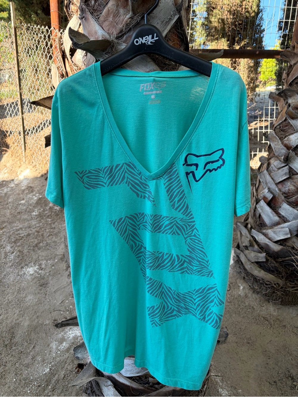 Fox Men’s Teal V-Neck Graphic Tee with Navy Logo